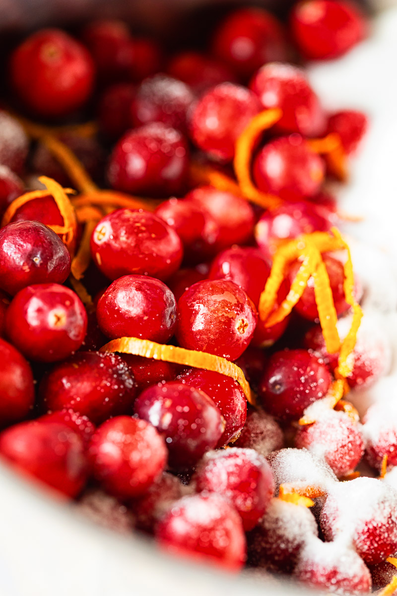 fresh cranberries sprinkled with sugar and orange zest 