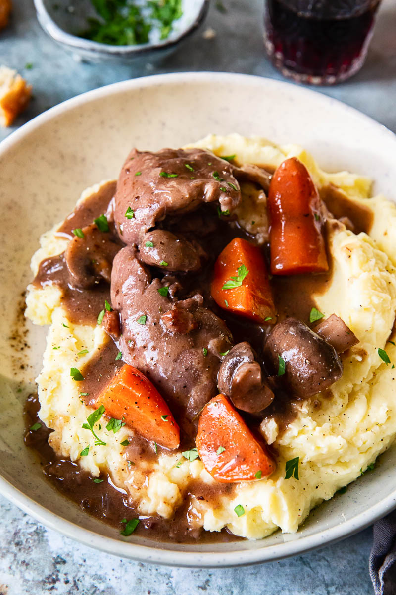 chicken and mushroom stew over mashed potatoes