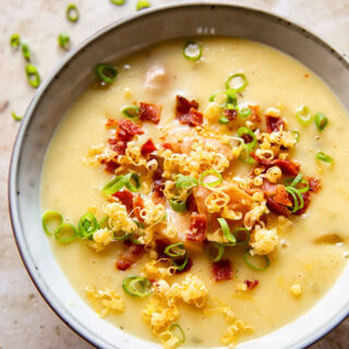 Potato Soup topped with bacon bits, green onions and grated cheese