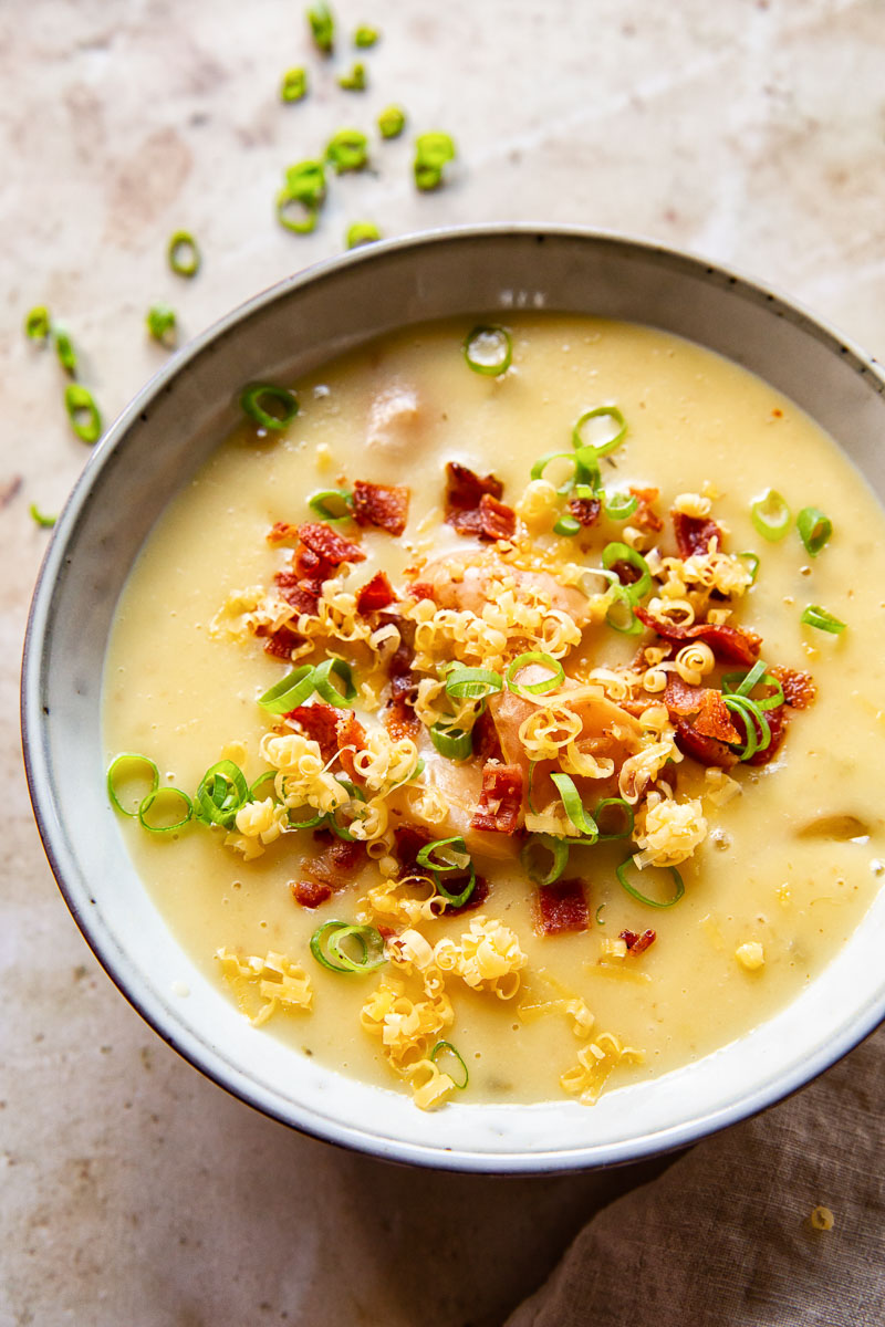 Potato Soup topped with bacon bits, green onions and grated cheese