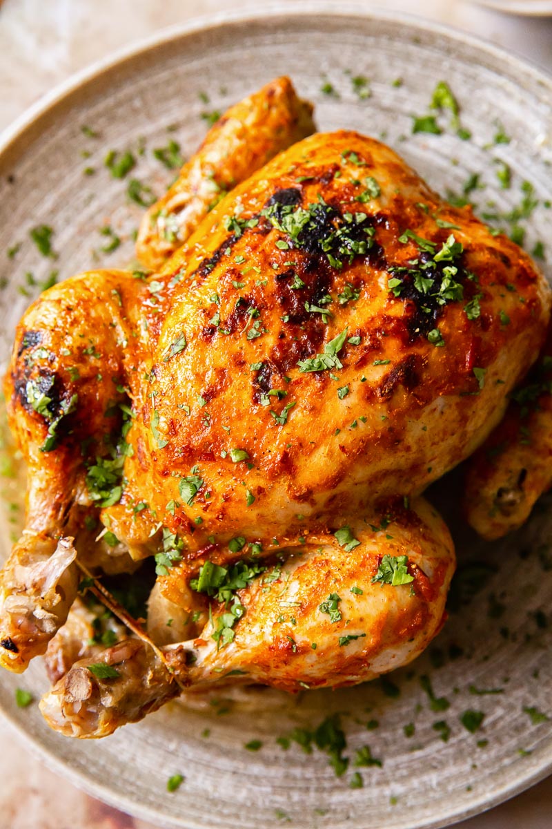 Roasted Whole Chicken on grey platter