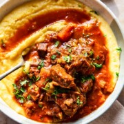 Italian beef stew over polenta
