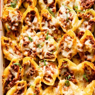 beef stuffed giant pasta shells topped with melted closeup