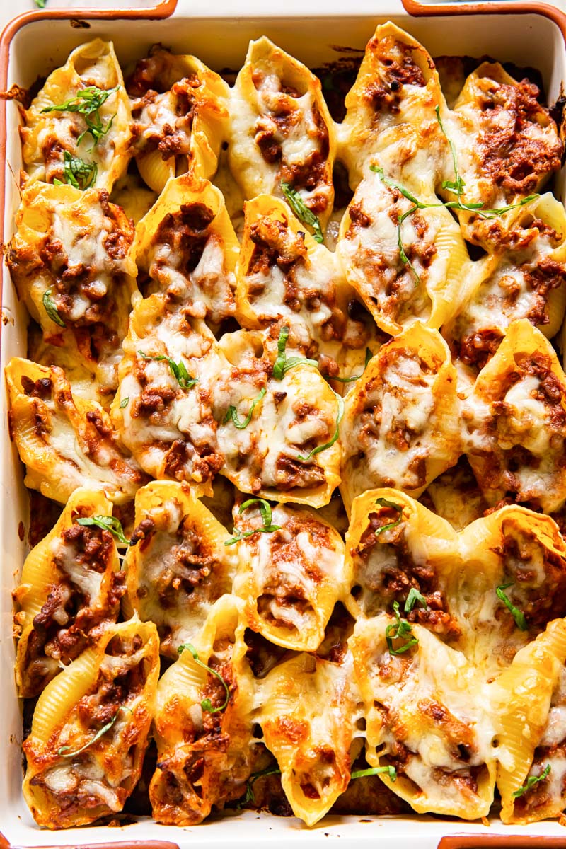 beef stuffed giant pasta shells topped with melted closeup