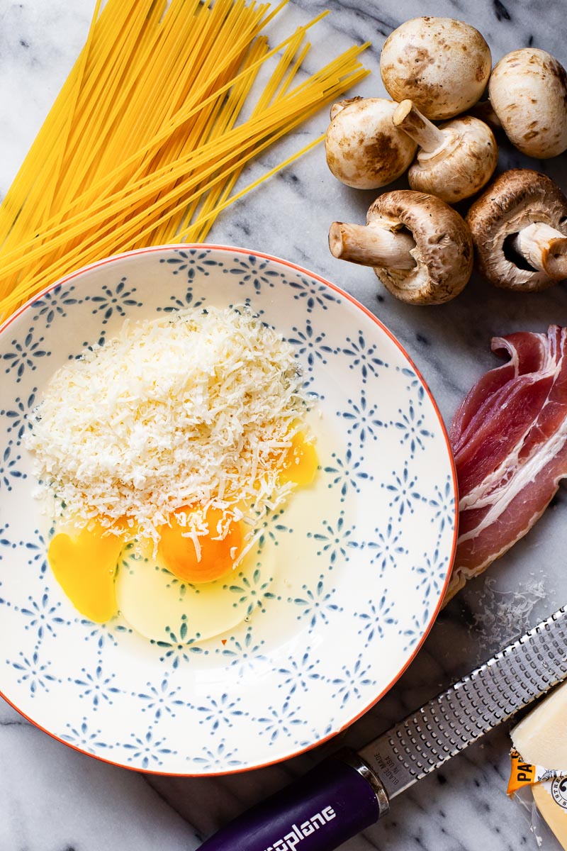 Ingredients for spaghetti carbonara with mushrooms