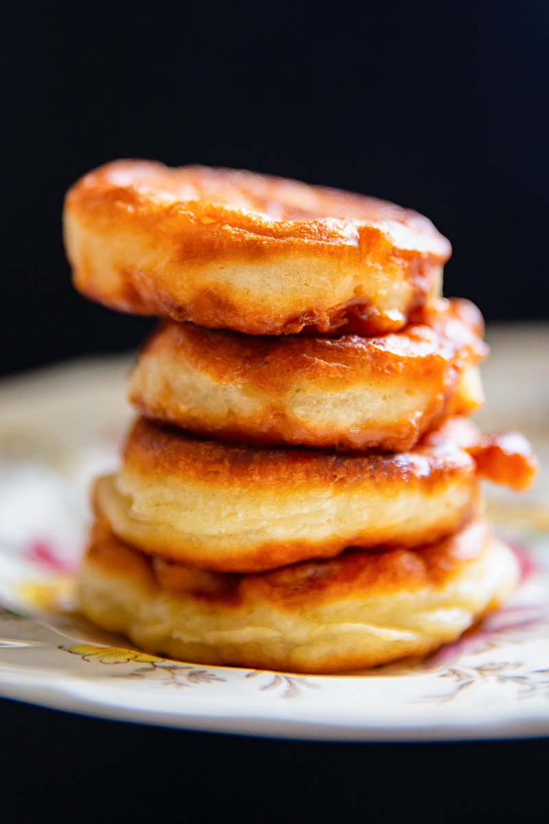 a stack of 4 fritters on plate