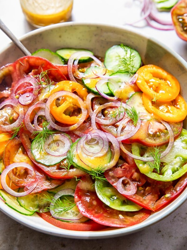 heirloom tomato and cucumber salad in a bowl