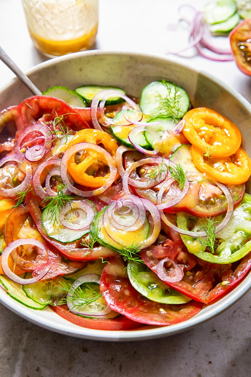 heirloom tomato and cucumber salad in a bowl