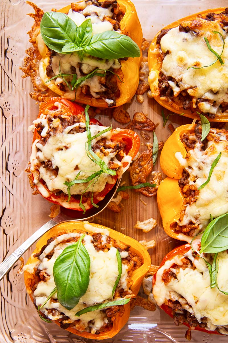 overhead view of stuffed red and yellow peppers