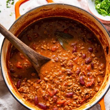 top down view of beef and kidney bean chilli con carne in orange pot