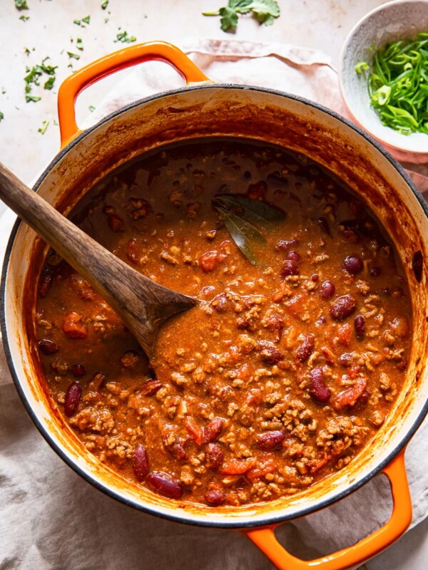 top down view of beef and kidney bean chilli con carne in orange pot