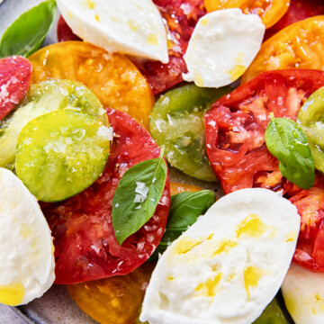 caprese salad on grey plate