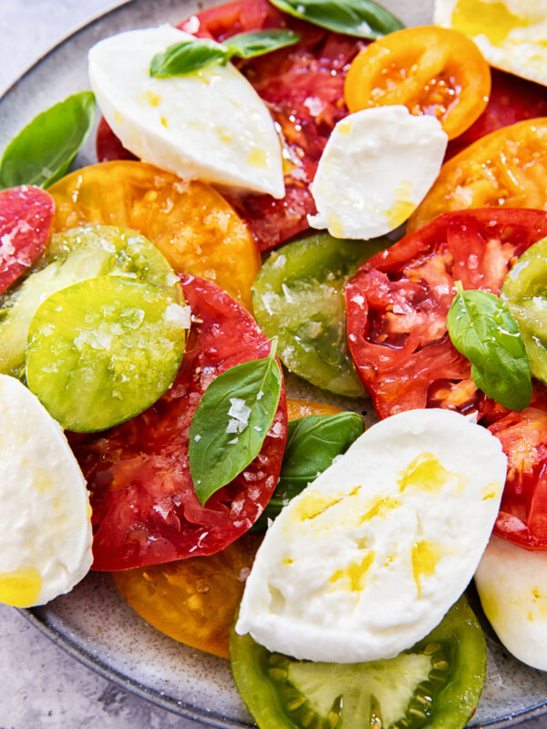 caprese salad on grey plate
