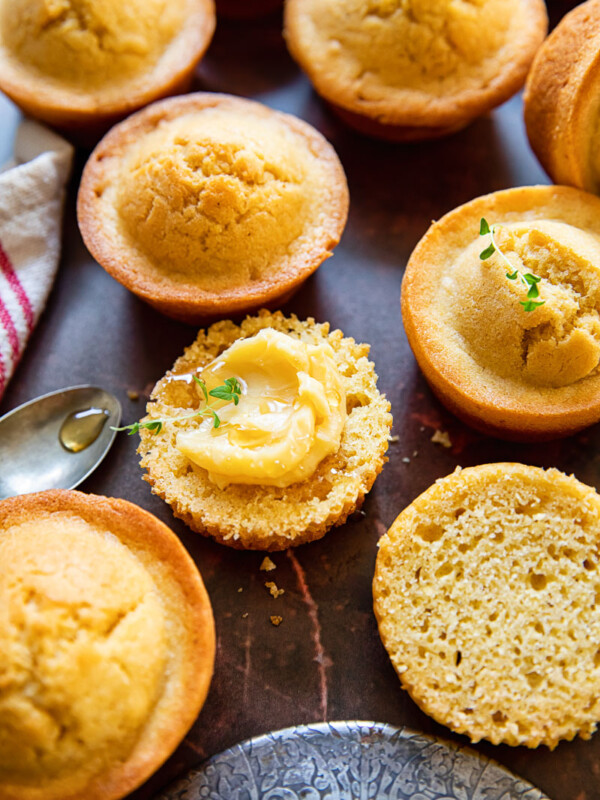 corn muffins, one topped with maple butter