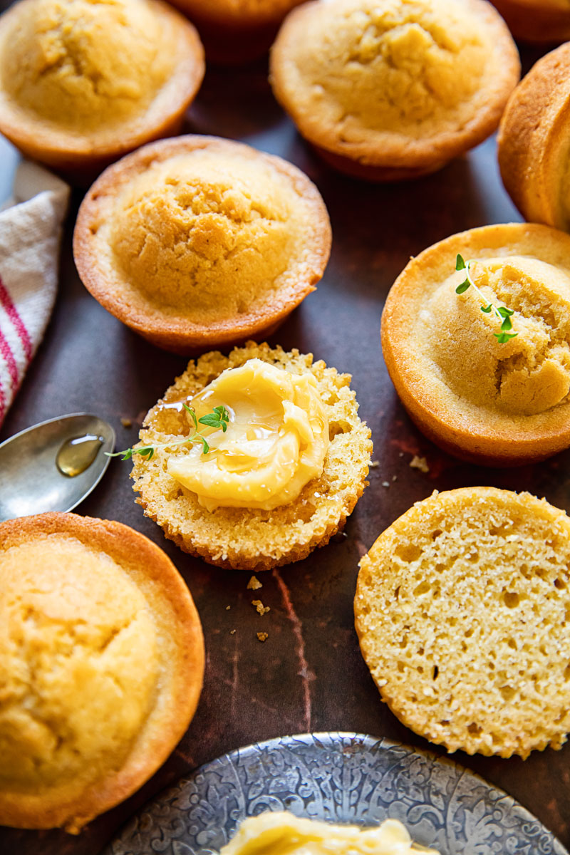 corn muffins, one topped with maple butter