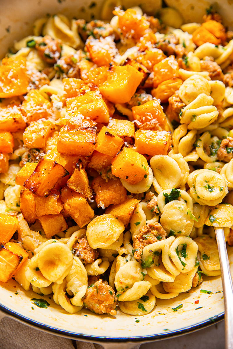 roasted butternut squash on top of orecchiette pasta