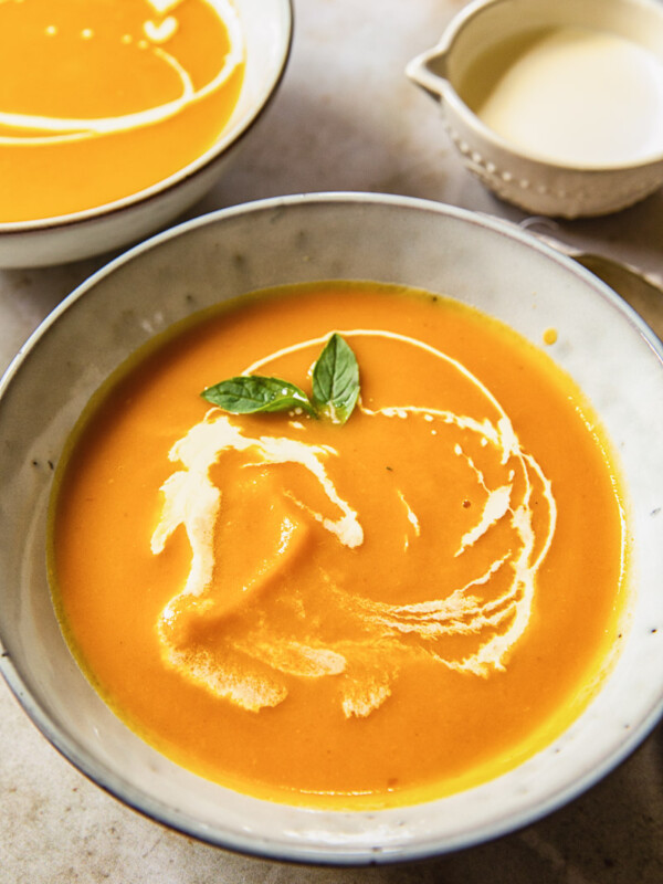 blended butternut squash soup with cream swirls