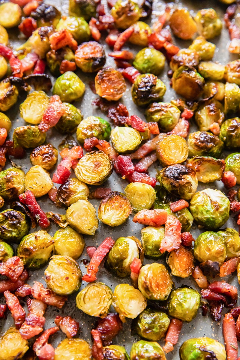 crispy brussels sprouts with bacon on roasting pan