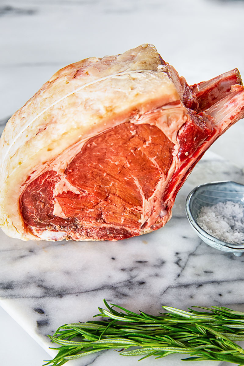 uncooked rib of beef on marble