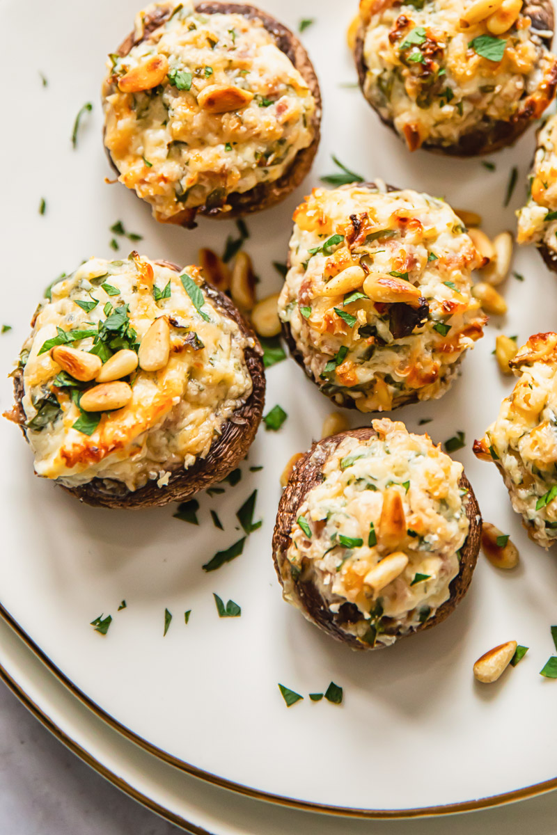 stuffed mushrooms on white plate 