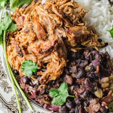 top down view of pulled pork with black beans and rice