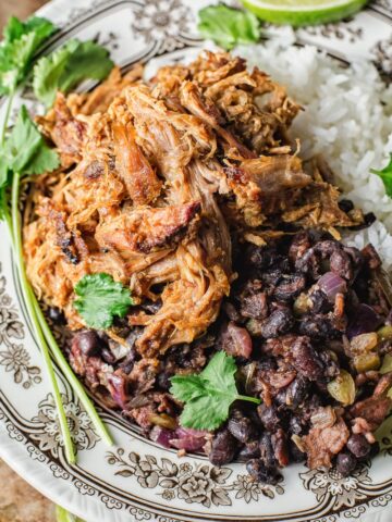 top down view of pulled pork with black beans and rice