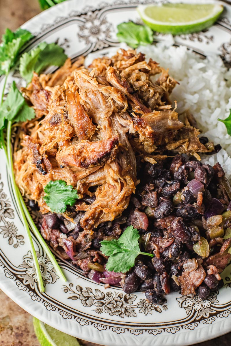 Top and bottom view of shredded pork with black beans and rice