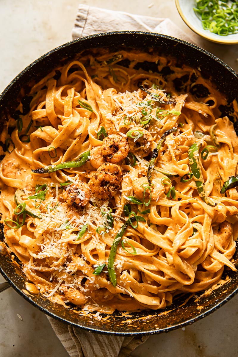 creamy tagliatelle pasta with shrimp, green onions and green peppers