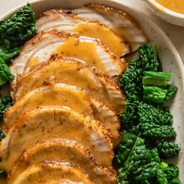 sliced pork loin roast covered with gravy