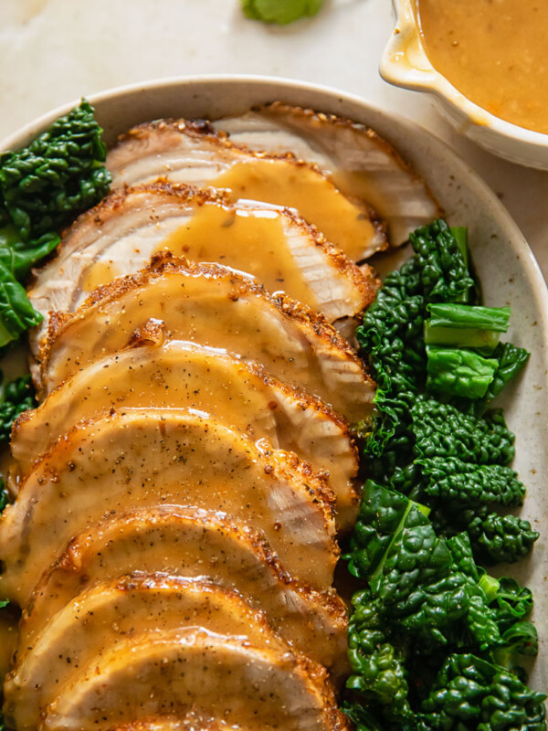 sliced pork loin roast covered with gravy