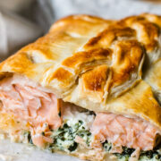 salmon en croute close up with salmon exposed