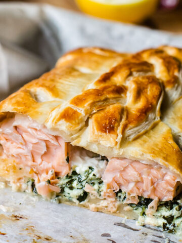 salmon en croute close up with salmon exposed