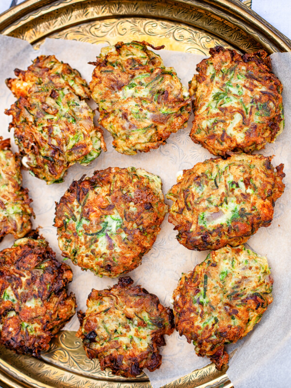 zucchini fritters on bronze platter