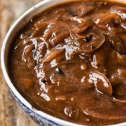 side view on onion gravy in a bowl