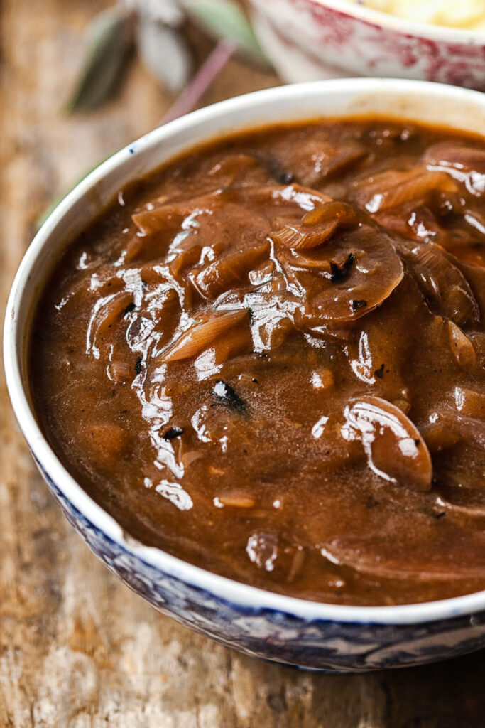 side view on onion gravy in a bowl