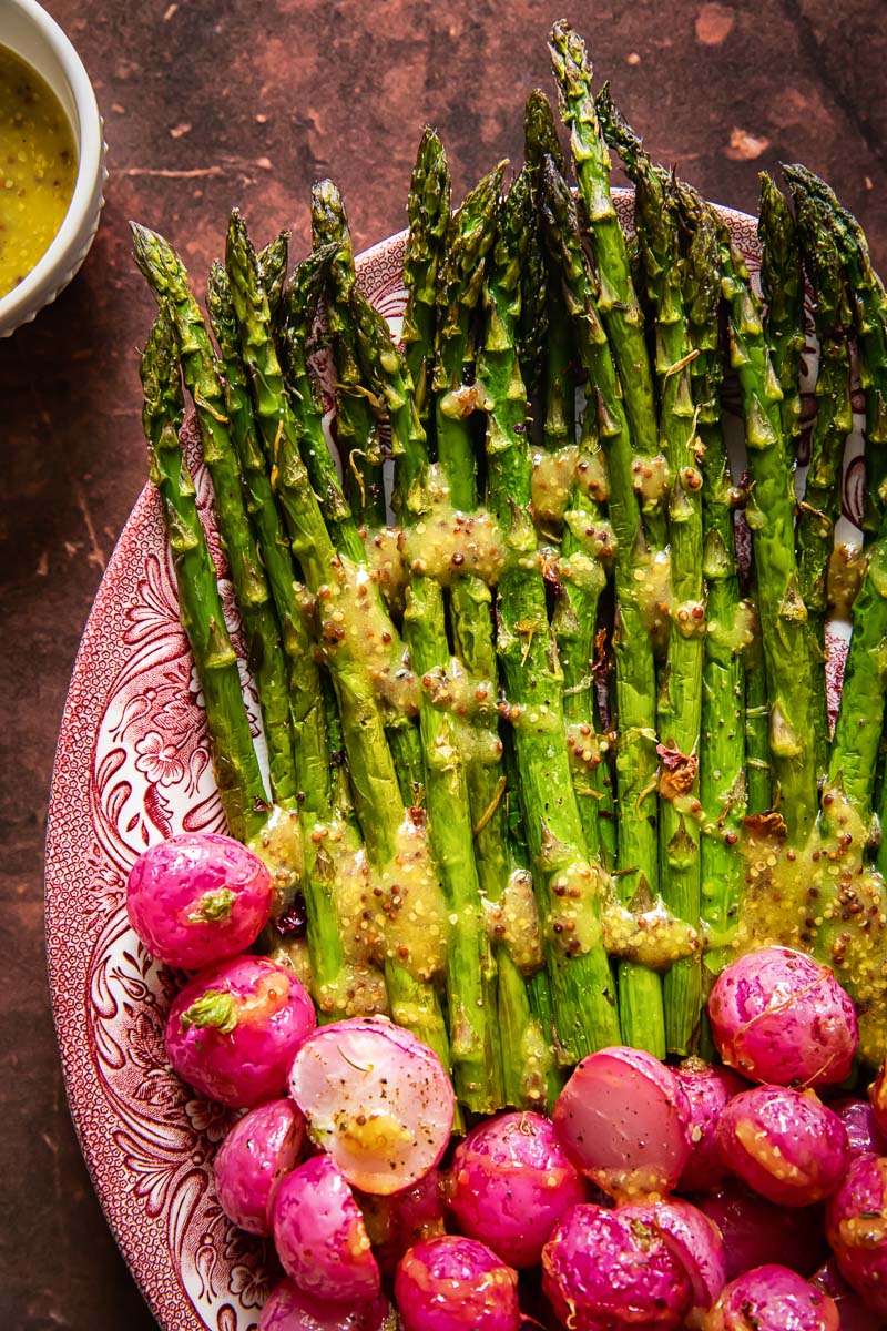 roasted radishes and asparagus on a platter