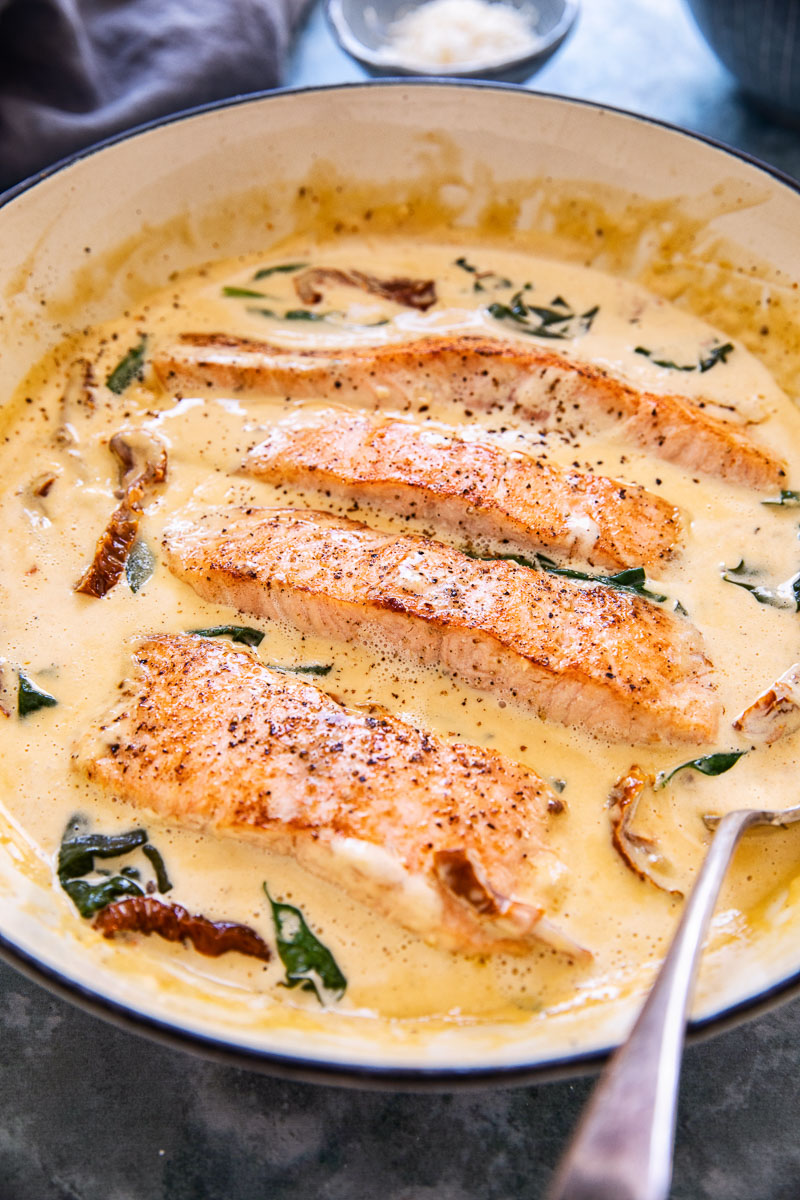 salmon in cream sauce in a while pan