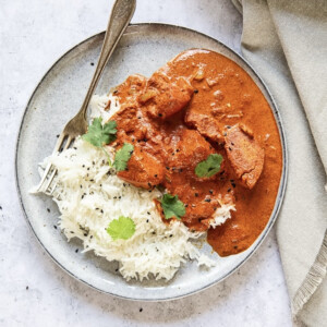 Butter chicken with rice on a plate