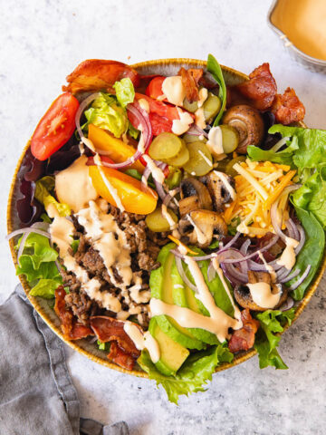 top down view of a salad with hamburger