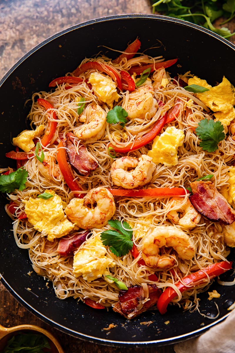 top down view of Singapore Noodles in a wok