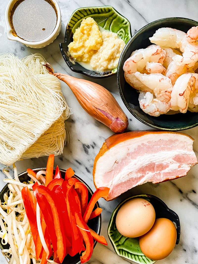 Singapore noodles ingredients on marble board