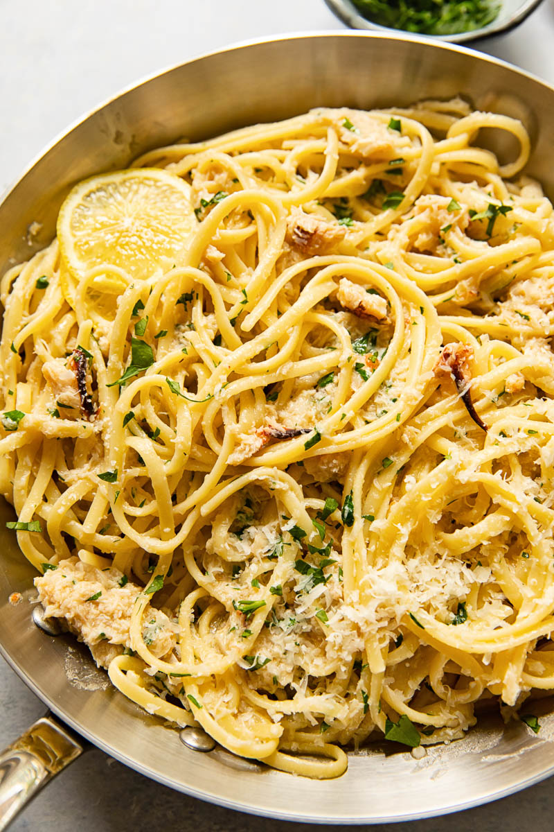linguine with crab in a stainless steel pan