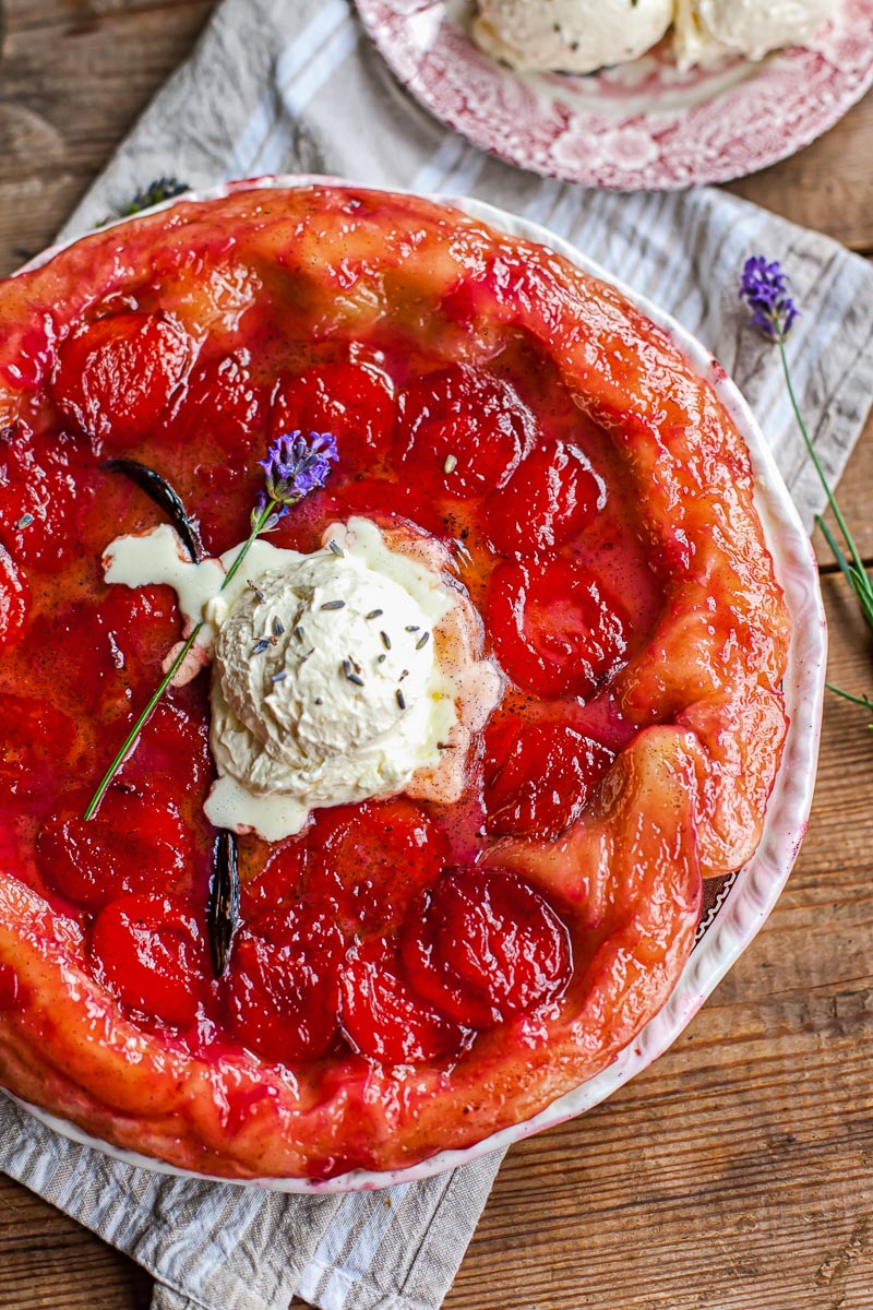 tarte tatin topped with lavender whipped cream