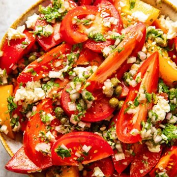 top down view of tomato salad in a bowl