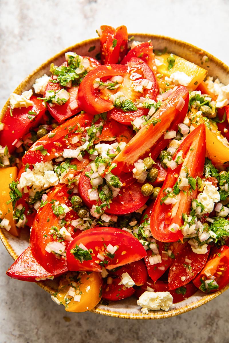 top down view of tomato salad in a bowl