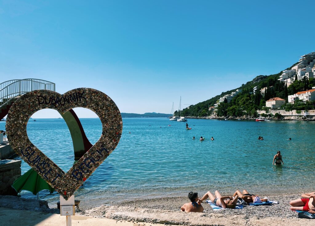 Beach with a stone heart in the foreground