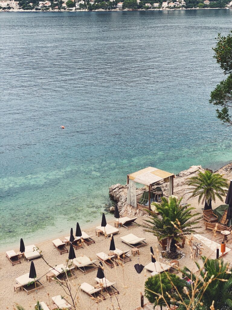 Top down view of a beach with furniture