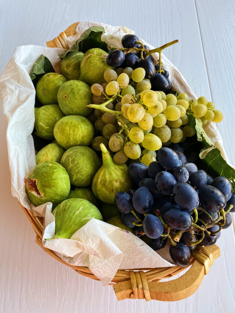 Basket of figs and grapes