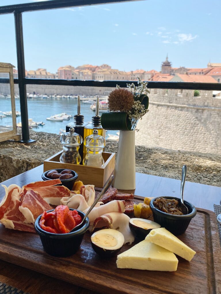 Charcuterie platter with view of the city
