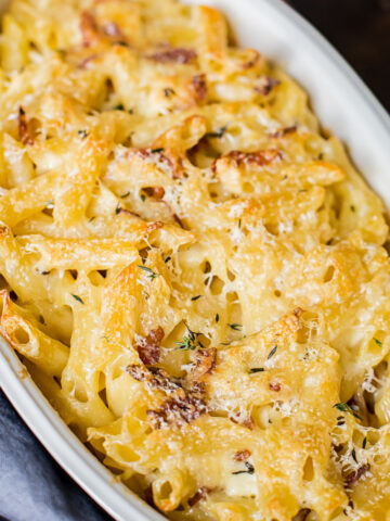 close up of macaroni and cheese in a baking dish